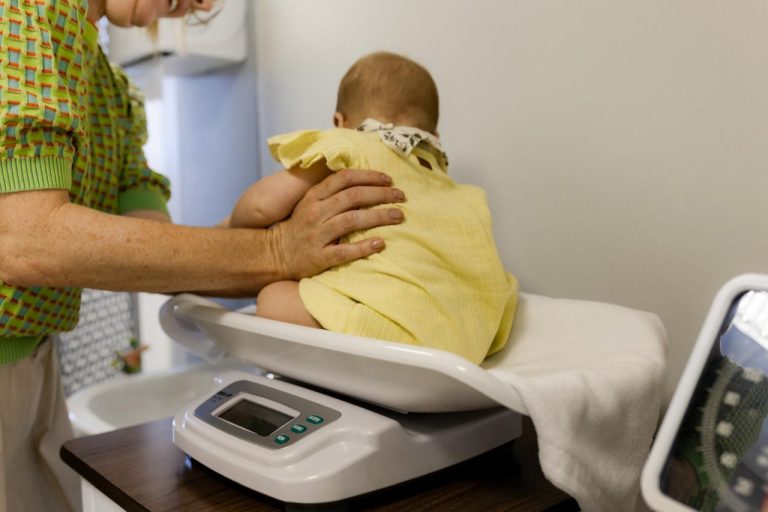Babe being weighed